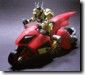 D.I.C.E. Motoraptor Vehicle Mode with Tak figure closeup. Click to Enlarge.